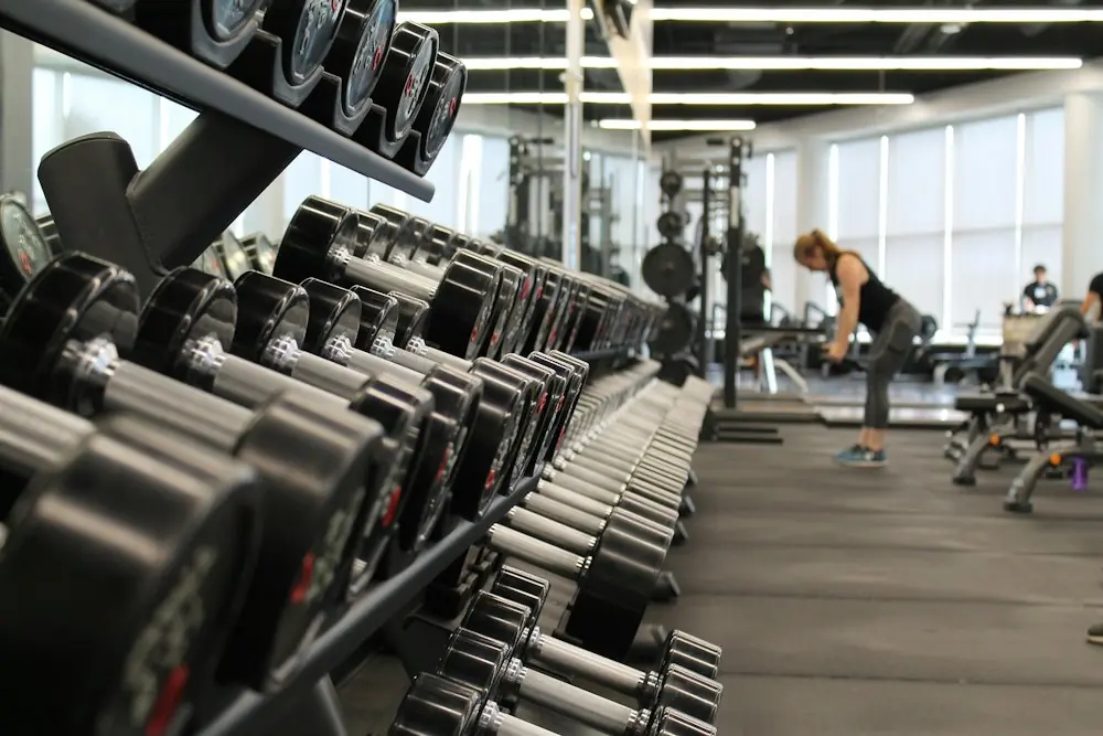 Dumbbell racks on the gym floor
